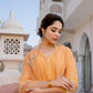 Pastel orange suit